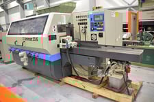 Weinig #U-23E, feed through moulder, 6-heads, 9-1/16" x 4-3/4" capacity, 1-9/16" spindle, variable speed, 2005