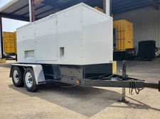 90 KW Elliott #100QD, portable diesel generator, sound attenuated enclosure, 277/480 Volts, 3643 hours, 2000