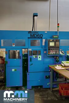 Murata #MD60, CNC turning center, 6" chuck, 10 ATC, JIS A2-5, single gantry 3-Axis loader, 2005