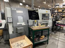 Kia #SKT-250M, CNC lathe, Fanuc 21iT, 29.5" swing, 2.5" bar, LNS bar feed, coolant, 2009
