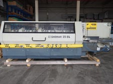 Weinig #Unimat-23-EL, feed through moulder, 7-head, 9-1/6" x4-3/4" capacity, 1-9/16" spindle, 16-78 FPM, 2000