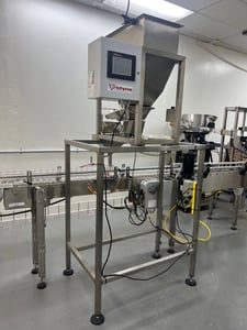 Tridyne #F100A, single lane scale with indexing conveyor, touch screen PLC