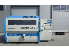 Weinig #U-23-E, feed through moulder, 6-head, 9-1/16" x 4-3/4" capacity, 1-9/16" spindle diameter, 2002