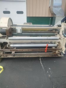 PCMC, turret unwind & rewind, 54" wide, 24" diameter,
