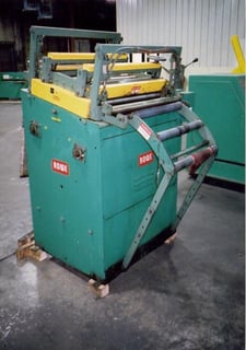 30" x .065" Rowe #B-30, 7-roll straightener, entry & exit power pinch rolls