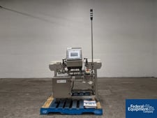 Thermo Scientific #Sentinel, multiscan pass-through style metal detector, mounted over customfit conveyor