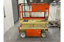 500 lb. JLG #1932-E, scissor lift, 19' platform height, 25' working height, 24V battery operated, 1997