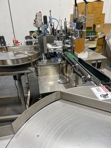 Wizerd Dynamik, automatic nail polish filling machine, pressurized tank, filling station with Teflon molds