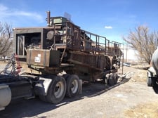 Eagle, portable roll crushing plant, with feed hopper. screening equipment, belt conveyor