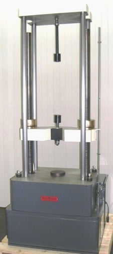 30000 lbf. Tinius-Olsen Electomatic, 20" W x 20" D table, 48" testing stroke, Reconditioned