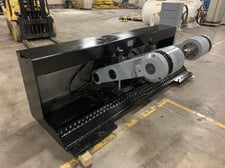 SHM, 60" diameter shaftless floor pickup unwind, 64" roll width, 3" double E chucks