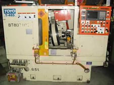 Toyo #T-465, 5-Axis Fanuc 160M CNC Control, power stock, 400mm honing wheel, coolant system, 2001