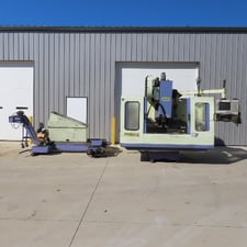 Takumi Seiki #V-11A, 3-Axis CNC vertical machining center w/4th-Axis 3PH & conveyor, 43.3" X, 21.6" Y, 25.5"