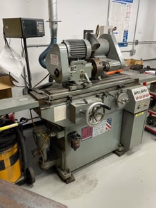 12" x 24" Parker #1C, universal grinder, power feed table, coolant