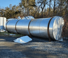 5800 gallon 304 Stainless Steel Horizontal Tank on legs, 82" H x 300" L, 2.5" fitting size