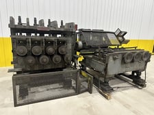 Sutton, 8 stand 2 plane flat & dhape straigthener with infeed & outfeed tables, 3-1/2" shaft diameter