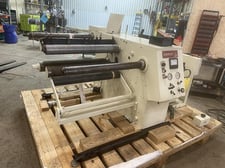 Stanford #142, 24" doctor rewinder with razor slitting edge, 24" roll diameter, 250 lb. roll weight