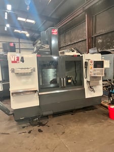 Haas #VF-4, CNC vertical machining center with full 4th Axis, 50" X, 20" Y, 25" Z, 8100 RPM, 24+1 side mount