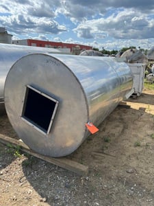 1800 gallon Stainless Steel tank, mounted on platform