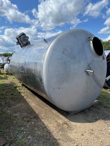 4000 gallon Stainless Steel mix tank, side bottom entering agitator, dish top & bottom, mounted on legs