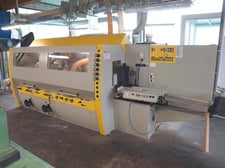 Weinig #U-23-EL, feed through moulder, 6-head, 9-1/16" x4-3/4" capacity, 1-9/16" spindle diameter, 20-118