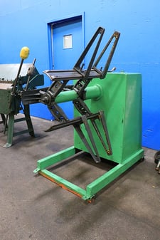 3000 lb. Regal #3000-12-SRNP-SD6, non-motorized uncoiler, 12" width, 48" outside dimensions, 15"-20" ID