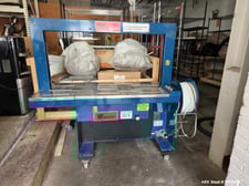 Wilton #SS80, Automatic Arch Case Strapping Machine, 25" width x 22" L x 15" H Aperture, 55" x 23" Table, 220