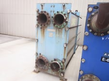 1452 sq.ft., Mueller, AT1306B-20, 316 Stainless Steel plates, Carbon Steel frame, 145 psi, 302&deg;F, 1997