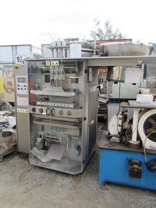 Schmucker SRL #Tube-53L, 3-head pouch filler / sealer