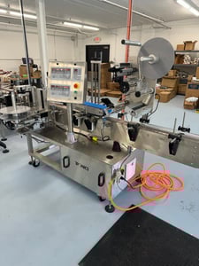 Tronics #S30TP, Wraparound and Top Labeler, 1200 inches of label per minute, 2018