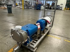 Waukesha #130, positive displacement pump, set up as top feed with bottom discharge, 3" dia. inlet/outlet