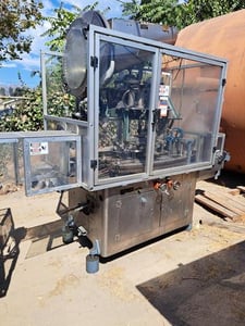 Resina #U40-282, inline spindle screw capper with capacity feeder, serial #67 3884