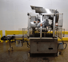 Resina, inline 4-spindle screw capper with capacity feeder
