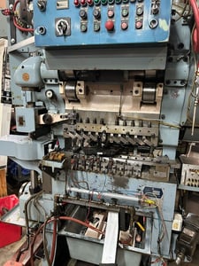Asahi Seiki #TP-25, transfer press, 2" stroke, 11 op die set, single row feed, Ori air cooled & brake, 1983
