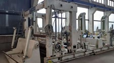 Toschi, 2-drum tissue slitter rewinder, 104"web width, 3 unwind stands, w/overhead crane, 2001