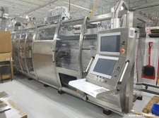 Serac 7-Cavity Linear Stretch Blow Molder, Capable of speeds ip to 10,000 bottles/hour