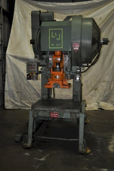 60 Ton, L & J #W60, OBI press, 4" stroke, 14" Shut Height, 3" ram adj., 50 SPM, 36" x24"bed, air clutch &