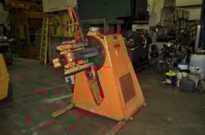 10000 lb. Mecon, motorized uncoiler, 25" mandrel width, 72" outside dimensions, 18"-20" ID, manual expansion