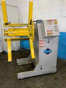 6000 lb. Coe Press Equipment #CPR-6024, coil reel, 24" width, 60" outside dimensions, 15"-20" ID, manual