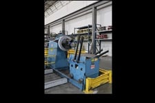 10000 lb. Rowe #10024-DSJ, servo feed line, 24" x .032" stock, pilot release, 7-rolls, entry & exit pinch