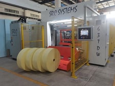SRC Systems #72TDW, 2-drum winder, 53" rewind diameter, shaftless floor pick up unwind