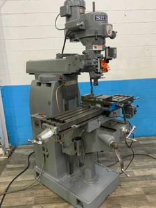 Sharp, ram type vertical mill, 10-1/2" x51" T-slotted table, 3 HP, 6" Kurt vise, chrome ways, 1984