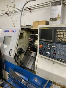 Daewoo Doosan Puma #230MSA, CNC lathe, 4-Axis, Fanuc 18iT, 21.7" swing, 1.7" bar, live tooling, 2002