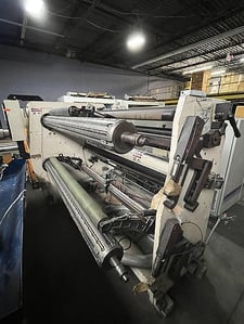 Deacro #DA-653, duplex cantilevered slitter rewinder, 65" web width, 30" unwind diameter, web guide