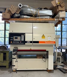 50" DMC #TC-1350M3, 3-belt sander, spare belts, feed table manuals, 2001