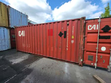 20' Red standard shipping container, CAI #CAIU3332295, small hole in floor