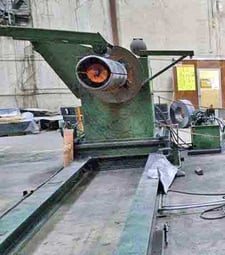 25000 lb. Rowe, uncoiler, 72", 68" face mandrel, hydraulic expansion, holddown roll
