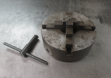 7-1/4" 4-Jaw universal plain back lathe chuck w/wrench (YMC)