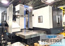 4.33" Daewoo Doosan #DBC110, 98" X, 78" Y, Fanuc 31i, 55" x71" B-Axis table, 4000 RPM, 40 HP, 60 automatic