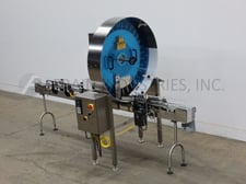 McBrady #200, rotary, inverted, air cleaner, 20-100 containers per minute, control panel has vari-speed